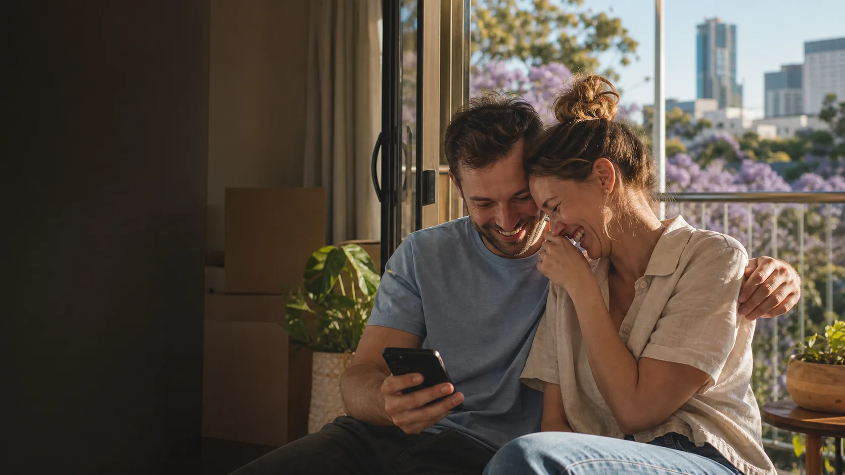 A couple sharing relief and happiness after receiving home loan news