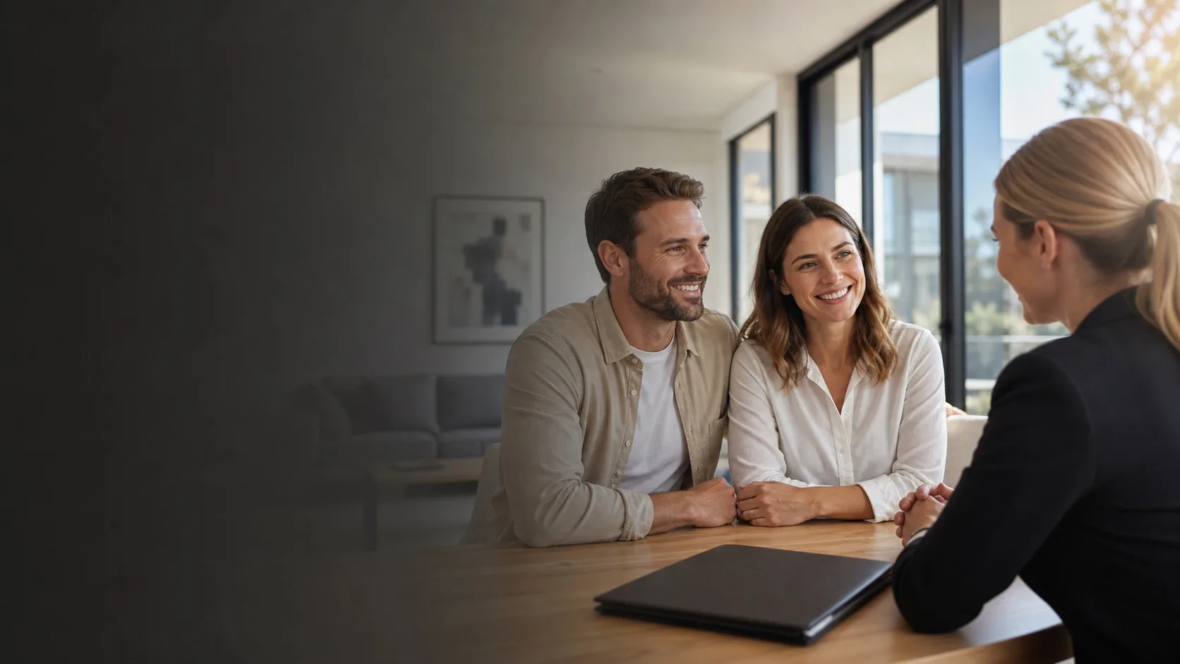Australian homebuyers discussing a property purchase with a professional adviser